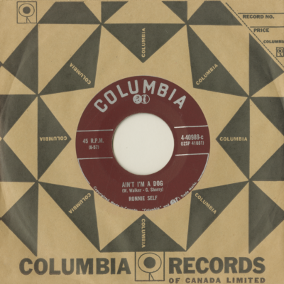 Ain't I'm A Dog / Rocky Road Blues (1957)